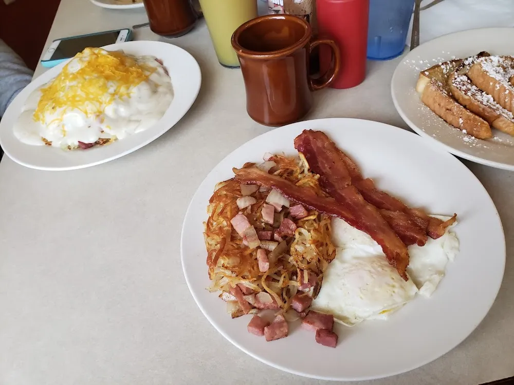 Kitchen Sink 2 Egg Breakfast Add Ham and Onion Hashbrowns